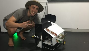 Alexandre Kneifel with his robot-in-progress "Shake n Bake"