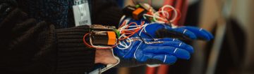 “Mini-mech” motion sensing gloves